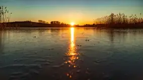 Zachód słońca nad grodziskiem Święta Góra i jeziorem Wojnowo, luty 2022 r. - zdjęcie 4