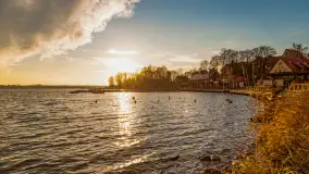 Zachód słońca w Rynie, jezioro Ryńskie, styczeń 2023 - zdjęcie 1