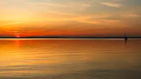 Zachód słońca nad jeziorem Dargin z komarami w planie - zdjęcie 16