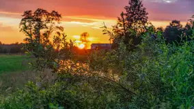 Zachód słońca nad rzeką Gołdapa w Baniach Mazurskich, lipiec 2025 r. - zdjęcie 5