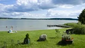 Zdjęcia: Malownicza i funkcjonalna plaża z czynu społecznego - zdjęcie 10