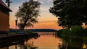 Zachód słońca, widok z wody na jezioro Święcajty - zdjęcie 6